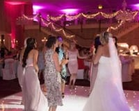 Twilight package @ Gisborough Hall, Starlit white Led dance floor, pink & purple uplighting and our giant illuminated Mr & Mrs.