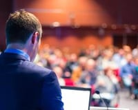 bigstock-Speaker-at-Business-Conference-64962394