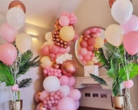 Balloon garland with helium balloon bunches