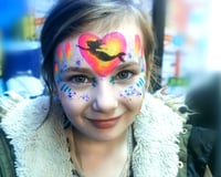 Bright colour Mermaid Face paint with glitter