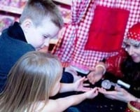 Amelie Appleby reads children's palms at Hamleys