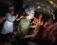 Saxophonist wedding party