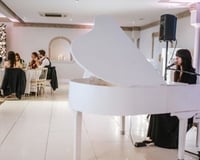 Performing during a wedding breakfast at Froyle Park