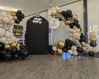 black and gold sailboard and hoop.jpg