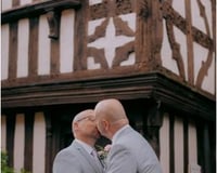 Two Grooms kissing