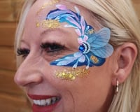 Adult facepaint with handmade bling