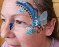 Adult facepaint with handmade bling