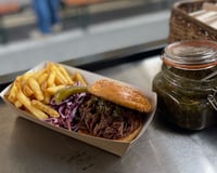 Beef Brisket Brioche Bun, fries, home slaw, pickle