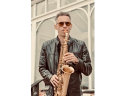 Carlo Saxophonist logo