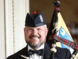 Andrew Paton, Highland Bagpiper logo
