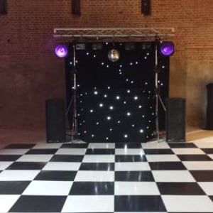 Black Gold Rig with mirrorball, Starcloth backdrop and uplighters (daylight)