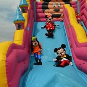 They Go Onto Bouncy Castles With the Children 