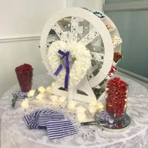Sweet ferris wheel hire in Hertfordshire, Bedfordshire, Essex & surrounding areas. 