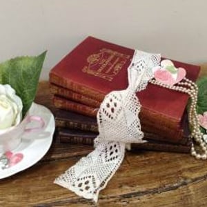 books pearls cup saucer confetti