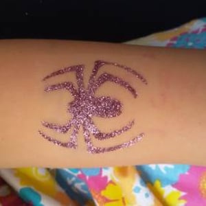 Spider glitter tattoo