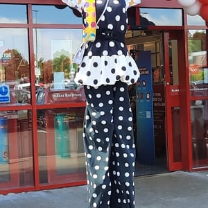 Stiltwalker Candy Clown refreshing the Matalan store Glenrothes.jpg