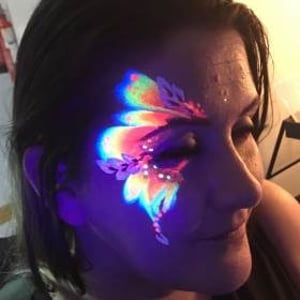 UV painting for adults at an evening corporate event