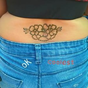 Lovely lower back design at a festival