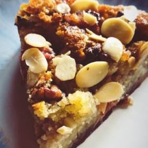 Rhubarb and almond tart with stew ginger and pecan nuts  