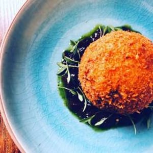 chorizo quail egg with onion relish  