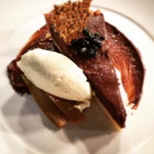 salted chocolate tart with clotted cream and hazelnut granola 