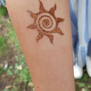 Sun Glitter tattoo