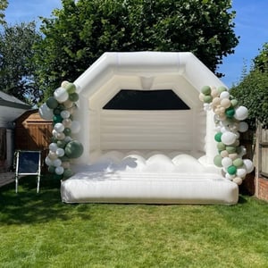 white bounchy castle 2 cheeky events