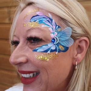 Adult facepaint with handmade bling