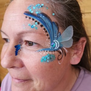 Adult facepaint with handmade bling