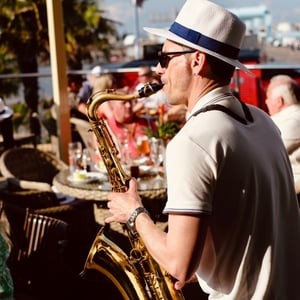 Saxophonist rooftop party