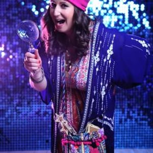 Fun Fortune Teller mingles through crowds with lighthearted insights, leaving guests laughing.