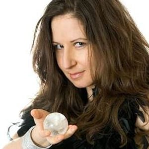 Amelie Appleby mingles amongst guests with her crystal ball
