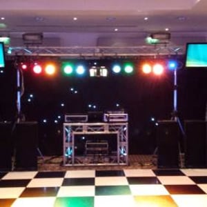 Black Platinum Disco Rig with large centrepiece, TVs and hi-tech DJ booth