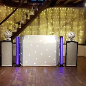 Mini-Hi-Tech Rig with white Starcloth DJ booth and UV tubes
