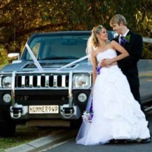 Silver Hummer H3 Limousine (Up to 8)