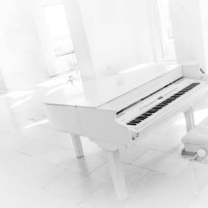 White Baby Grand Piano