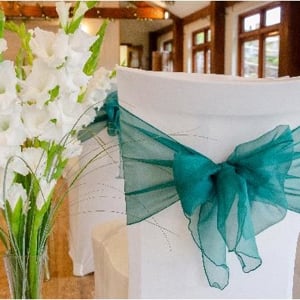 gladioli vases and chair covers