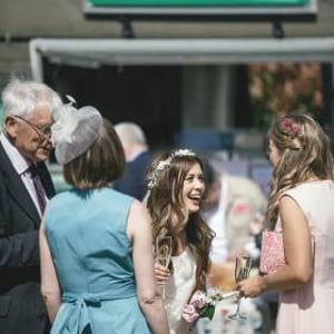 A very happy bride at a wedding for 130
