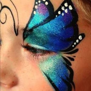 Face painting single eye butterfly