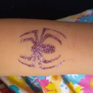 Spider glitter tattoo
