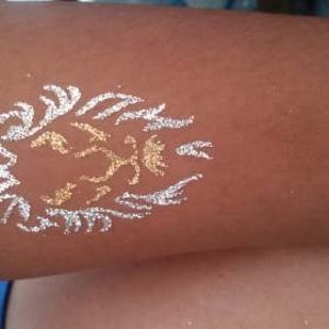 Lion glitter tattoo