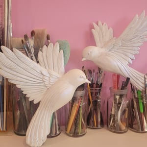 Hand carved birds for Annabells Private members club