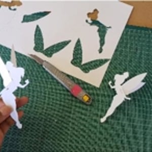 Tinkerbell place names / cake tops. 