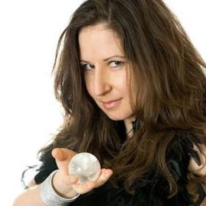 Amelie Appleby mingles amongst guests with her crystal ball