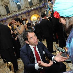 Amelie Appleby entertains with palm readings at Corporate Events