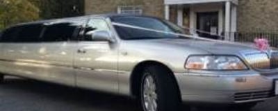 Silver Limo. Perfect for Parties Weddings and Proms. We also have a silver Chrysler 8 seat limo