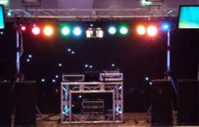 Black Platinum Disco Rig with large centrepiece, TVs and hi-tech DJ booth