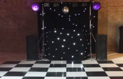 Black Gold Rig with mirrorball, Starcloth backdrop and uplighters (daylight)