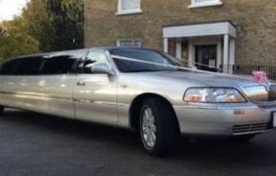 Silver Limo. Perfect for Parties Weddings and Proms. We also have a silver Chrysler 8 seat limo