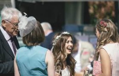 A very happy bride at a wedding for 130